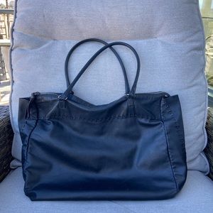 Authentic Miu Miu Leather Shoulder Bag. Fair condition. Some markings